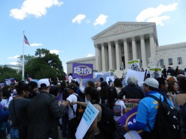 Demonstrators protesting law SB 1070 were gathered in front of the Supreme Court.  Photo from Mexicans Without Borders on Flickr (CC BY 2.0)