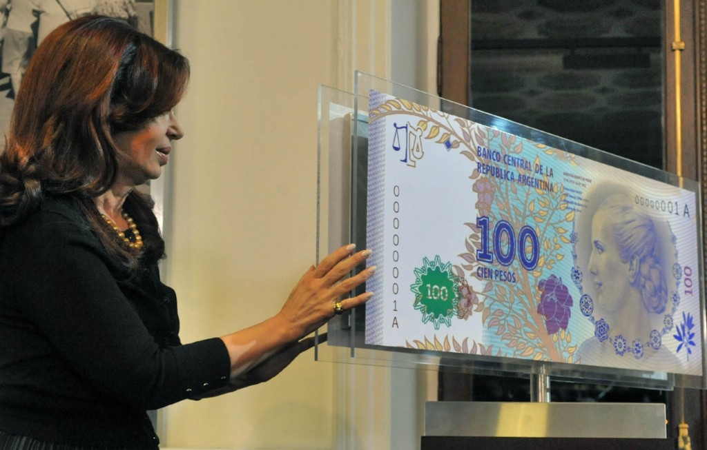 Presentation of the 100 peso bill as a tribute to Eva Peron.  Image by Casa Rosada, used under Creative Commons license CC-BY-SA