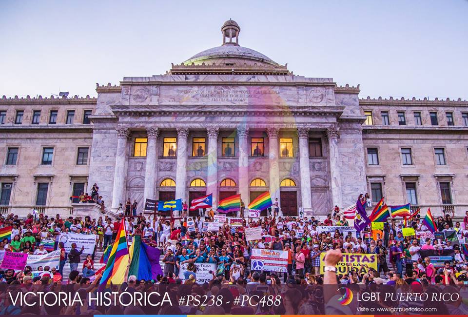 Groups in favor of LGBTQ rights celebrate the passing of the measures in front of the Capitol building. Photo taken from <a href="https://www.facebook.com/photo.php?fbid=349589555162990&amp;set=a.334035140051765.1073741828.333428936779052&amp;type=1&amp;relevant_count=1" target="_blank">LGBT Puerto Rico</a>'s Facebook page.