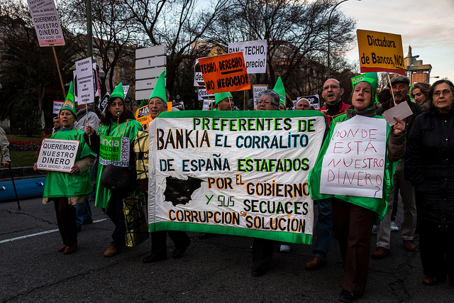 Protesta contra la corrupción del sector bancario y el gobierno. Foto tomada de la página oficial de Ganemos Madrid, y usada bajo Licencia CC. 